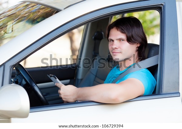 the guy\
sitting in the car with the keys in the\
hands