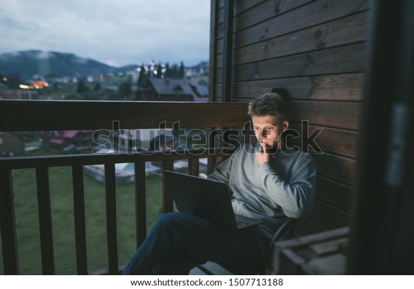 Guy Sitting Cottage On Balcony Evening Stock Photo Edit Now