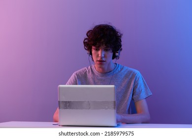 Guy Sitting At The Table Gaming Laptop Isolated Background
