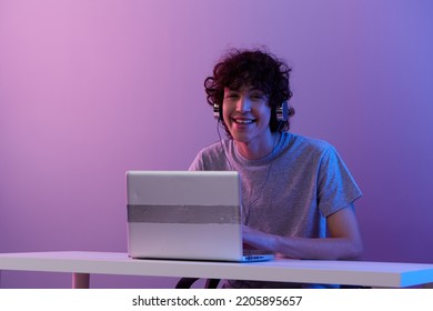 Guy Sitting At The Table Gaming Laptop Isolated Background