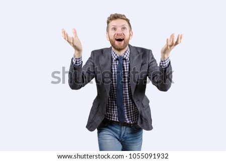 guy smiling looking up, lifting his hand up, insight, side view