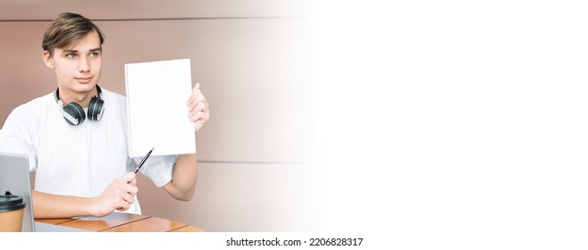 Guy Student Outdoors With White Sheet In Hands. Selective Focus, Banner