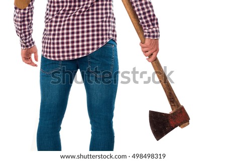 Guy supporting an axe in his right hand isolated on white background 