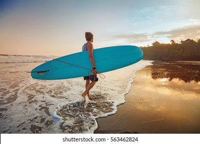 guy surfing on a sunset "instagram" style colors - Powered by Shutterstock