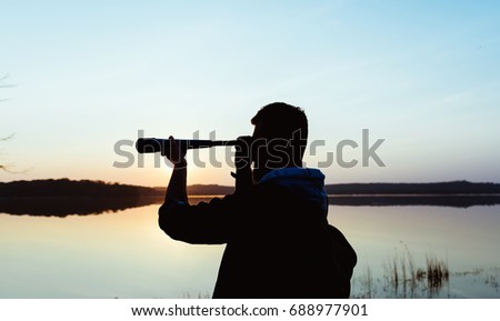 A guy with a telescope for nature...