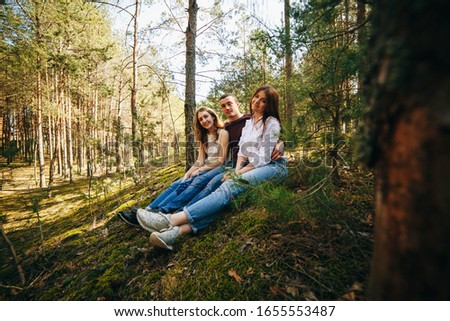 Similar – Frauenfreunde lachend bei Spaziergängen im Wald