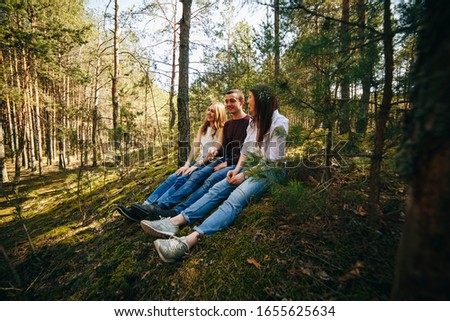 Similar – Frauenfreunde lachend bei Spaziergängen im Wald