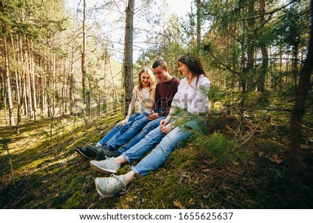 Similar – Frauenfreunde lachend bei Spaziergängen im Wald