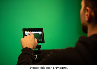a guy using camera display