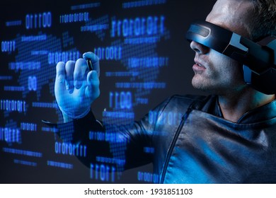 Guy using VR helmet. Augmented reality, future technology, game concept. Blue neon light. Man holding pill with futuristic holographic interface with formulas and research data in the foreground.