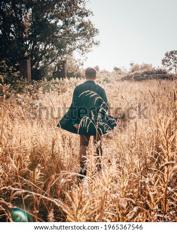 Similar – Image, Stock Photo Woman in her back with the hands in the head enjoying the nature.