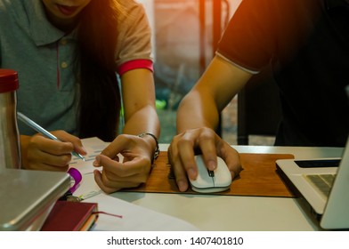Guy and woman are consulting wotk - Shutterstock ID 1407401810
