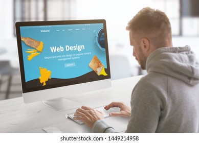 Guy Work On Modern Web Site On Computer In Graphic, Web Design Studio Office. Concept.