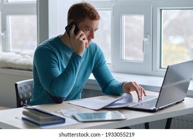 guy works from home. man using laptop, typing on keyboard, writing email or message, chatting, shopping, successful freelancer working online on computer.