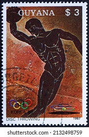 GUYANA - CIRCA 1987: A Stamp Printed In Guyana Shows Discus, Sport, 1988 Summer Olympics, Seoul, Circa 1987