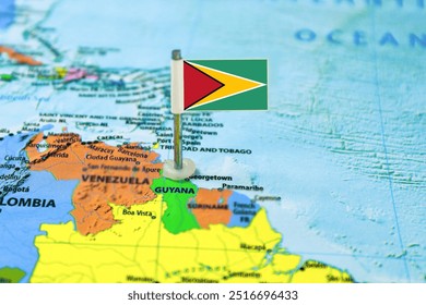 Guyana flag on the map with selective focus and shallow DOF