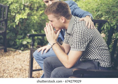 Guys Sharing Life Problems Always Support Best Friends. Friends Getting Down Heart Broken. Sad Man Sitting Outdoor In The Park Feeling Sadness Has A Problems Life Crisis. Best Friend Mental Concept.