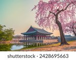 Gyeongbokgung Palace and cherry blossoms in spring. Seoul South Korea.Sign "Royal Banquet Hall" on building of traditional Korean architecture