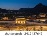Gyeongbokgung Palace Sunset to night in South Korea with the name of the palace ‘Gwanghwamun Gate on the sign