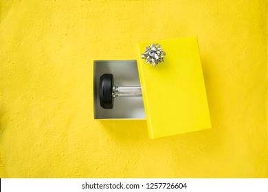 Gym Background With Dumbbell In Gift Box Of Christmas New Year