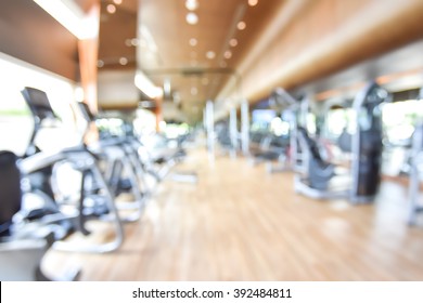 Gym blur background fitness center, workout personal training studio, health club with blurry sports exercise equipment for aerobic, bodybuilding and power strength class - Powered by Shutterstock