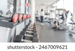 Gym dumbbell blur background fitness center, workout personal weight training studio, health club with blurry sports exercise equipment for bodybuilding and power strength class