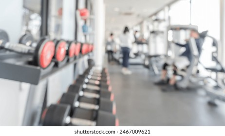 Gym dumbbell blur background fitness center, workout personal weight training studio, health club with blurry sports exercise equipment for bodybuilding and power strength class - Powered by Shutterstock