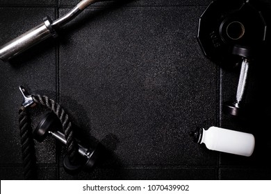 Gym Equipment On Dark Background In Cross Gym For Fit People