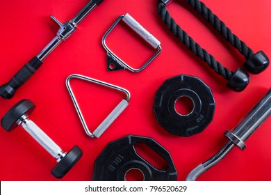 Gym Equipment On Red Background