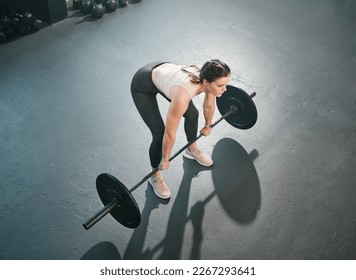 Gym exercise, barbell deadlift and woman doing muscle fitness performance, workout or body building. Strong girl, health lifestyle and top view of strength training athlete, person or bodybuilder - Shutterstock ID 2267293641