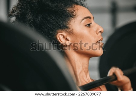 Gym face, barbell workout and black woman doing muscle fitness performance, strength training or bodybuilding. Exercise, strong body health or bodybuilder weightlifting for athlete wellness lifestyle