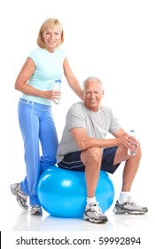 Gym & Fitness. Smiling Elderly Couple Working Out. Isolated Over White Background