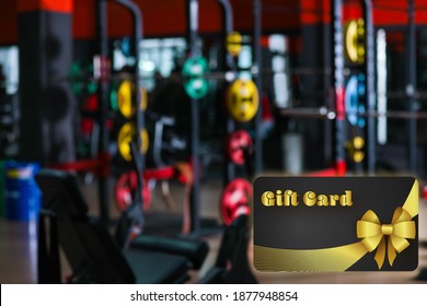 Gym Gift Card. Blurred View Of Health Club With Modern Equipment