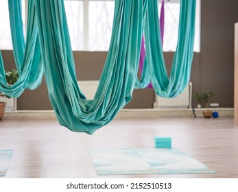 Gym with hammocks for aerial yoga. - Powered by Shutterstock