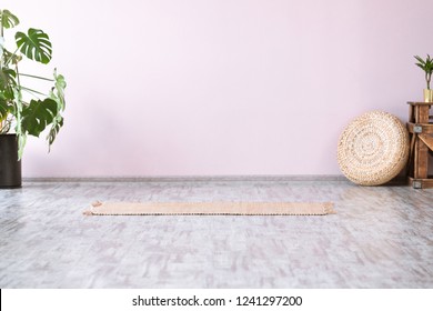 Gym Interior With Yellow Bamboo Yoga Mat, Monstera Tropical Flower, No People. Copy Space