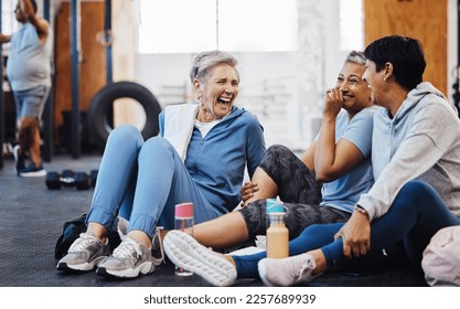 Gym, laughing and group of mature women telling joke after fitness class, conversation and comedy on floor. Exercise, bonding and happy senior woman with friends sitting chatting together at workout. - Powered by Shutterstock