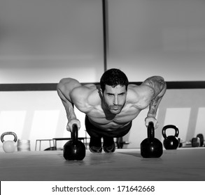 Gym Man Push-up Strength Pushup Exercise With Kettlebell In A Crossfit Workout