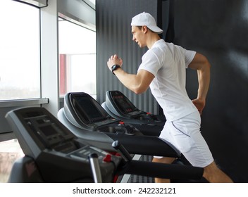 Gym Man Running On The Treadmill