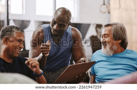 Gym, membership and personal trainer with men for sign up, planning and workout routine on blurred background. Health, checklist and coach with old people on floor for training, goals and motivation