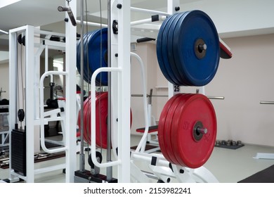 Gym Modern Fitness Center Room. Empty Hall With Simulators On Different Muscles. No People