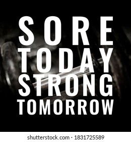 Gym motivational quote - Sore today, strong tomorrow - with partially visible dumbbell as a background with grunge effect.