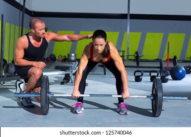 Gym Personal Trainer Man With Weight Lifting Bar Woman Workout In Fitness Exercise