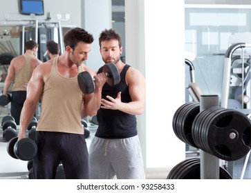 Gym Personal Trainer Man With Weight Training Equipment