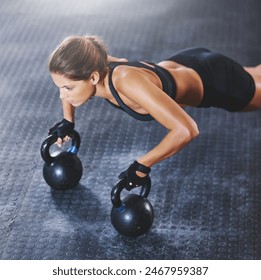 Gym, plank and woman with kettlebell for training, strength and endurance with weight lifting. Female bodybuilder, resilience and body goals with workout, exercise and fitness progress with push ups - Powered by Shutterstock