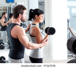 Gym Woman Personal Trainer Man With Weight Training Equipment