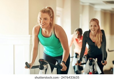 Gym, women and exercise with bike, fitness and wellness with training, balance and support. Healthy people, friends and girls with equipment, endurance and progress with challenge, workout and cardio - Powered by Shutterstock