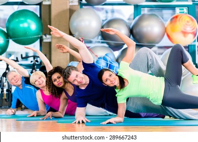 Gymnastic Group In Gym Exercising And Training, Diversity People, Old, Young, Black And White