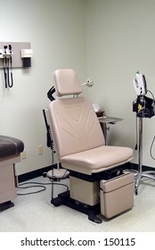 GYN Chair In Exam Room At Medical Doctor's Office