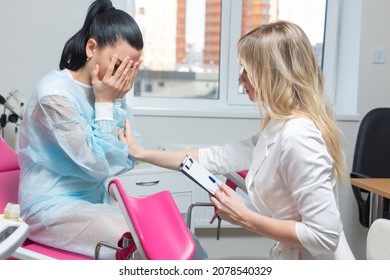 A Gynecologist Comforts A Crying Girl Sitting In A Gynecological Chair After The News Of A Frozen Pregnancy. Pregnancy Loss, Sexually Transmitted Infections, Psychological Support, Medical Ethics