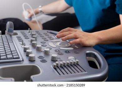 The Gynecologist Conducts An Ultrasonic Scan Of The Patient